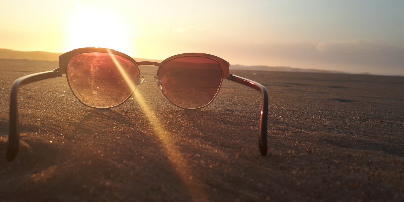 Image of sunglasses on the Sand Image of sunglasses on the Sand