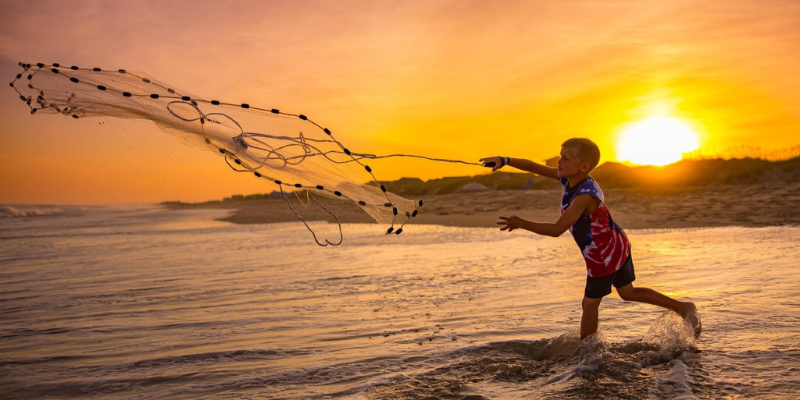 Fishing at Sunset - Photo Contest Winner Fishing at Sunset - Photo Contest Winner
