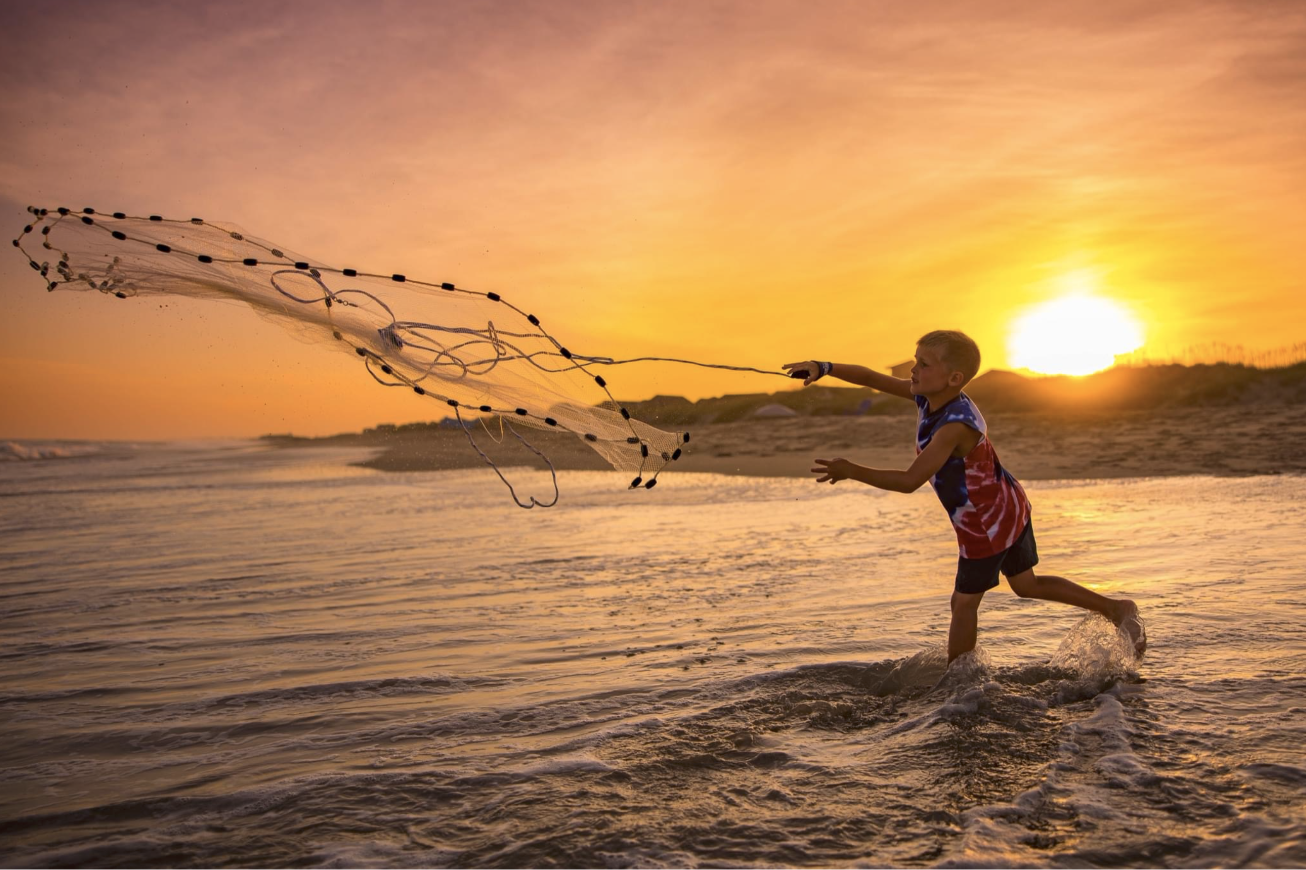 1st Place Winner: Cast-Net Sunset by Tyler Clarke