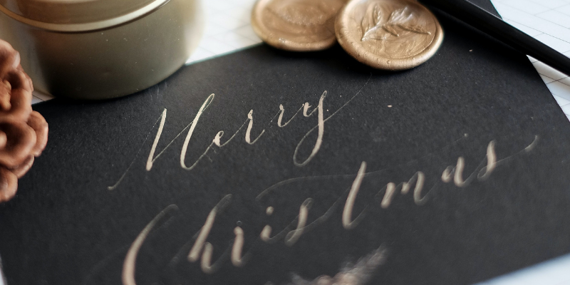 Gift Certificates for OBX Adventures Gift Certificates for OBX Adventures - Black card with gold writing that says "Merry Christmas"